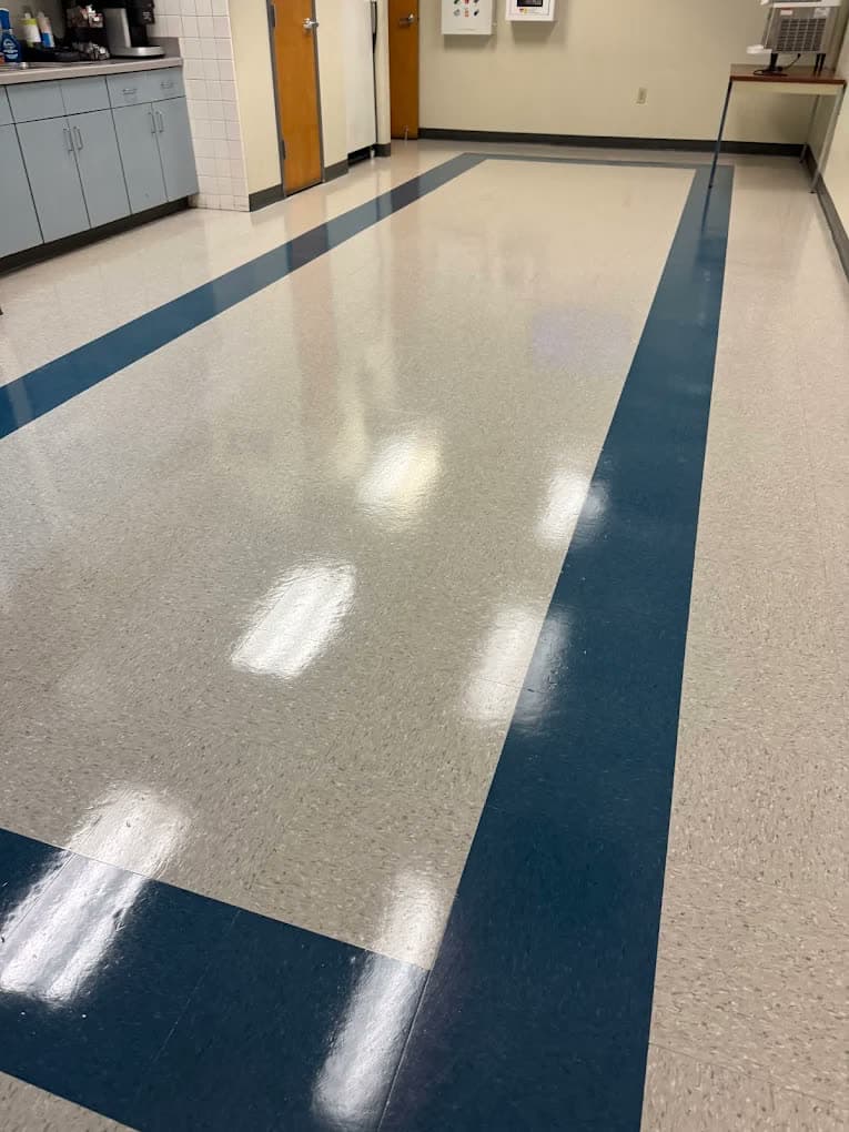 Freshly finished break room floor with a glossy tile surface